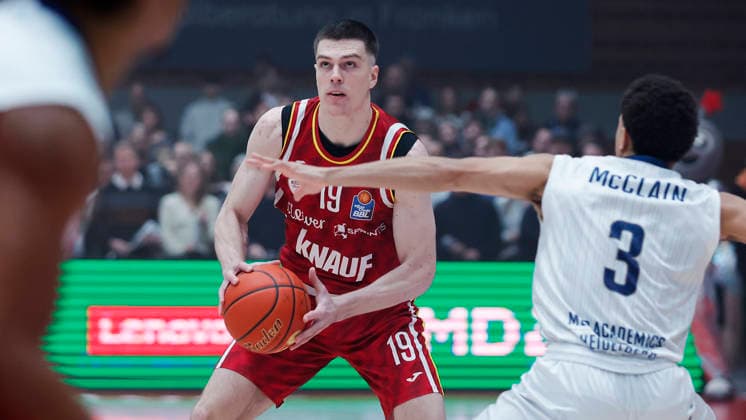 In the picture from left Christian Skladanowski Wuerzburg Baskets, 19 against Kevin McClain MLP Academics Heidelberg, 3 13 02 2026, Fitness First Wuerzburg Baskets vs MLP Academics Heidelberg, easyCredit BBL, Matchday 20, Germany, 97072, tectake Arena Wuerzburg, Copyright: HMBxMedia xJulienxBecker
