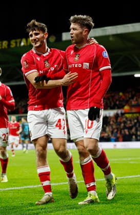 Wrexham, Wales, 13th February 2026. Josh Windass of Wrexham (r) celebrates scoring the first goal during the Wrexham vs Ipswich Town FA Cup fourth round match at the SToK Car Ras, Wrexham. Picture credit should read: Cody Froggatt Sportimage EDITORIAL USE ONLY. No use with unauthorised audio, video, data, fixture lists, club league logos or live services. Online in-match use limited to 120 images, no video emulation. No use in betting, games or single club league player publications. SPI_026_CF_WREXHAM_V_IPSWICH SPI-4531-0025