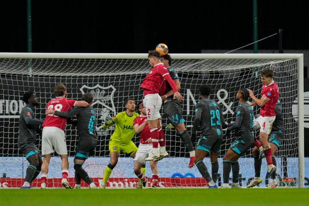 13th February 2026; SToK Cae Ras Stadium, Wrexham, Wales; FA Cup Football, Wrexham versus Ipswich Town; Callum Doyle of Wrexham heads goal wards  StevexFlynn