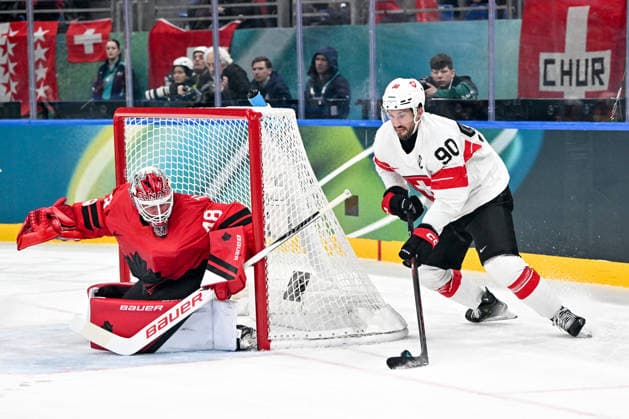 MILAN, ITALY - FEBRUARY 13: Roman Josi of Switzerland in action against goalkeeper Logan Thompson of Canada during the Men™s Prelim Round match between Canada and Switzerland on day seven of the Milano Cortina 2026 Winter Olympic Games, Olympische Spiele, Olympia, OS at Milano Santagiulia IHO Arena on February 13, 2026 in Milan, Italy. Milan Milano Santagiulia IHO Arena Italy *** MILAN, ITALY FEBRUARY 13 Roman Josi of Switzerland in action against goalkeeper Logan Thompson of Canada during the Men™s Prelim Round match between Canada and Switzerland on day seven of the Milano Cortina 2026 Winter Olympic games at Milano Santagiulia IHO Arena on February 13, 2026 in Milan, Italy Milan Milano Santagiulia IHO Arena Italy Copyright: xJustPictures.ch AndreaxBrancax jp-en-EuSpIm-AB-AAB_540413022026