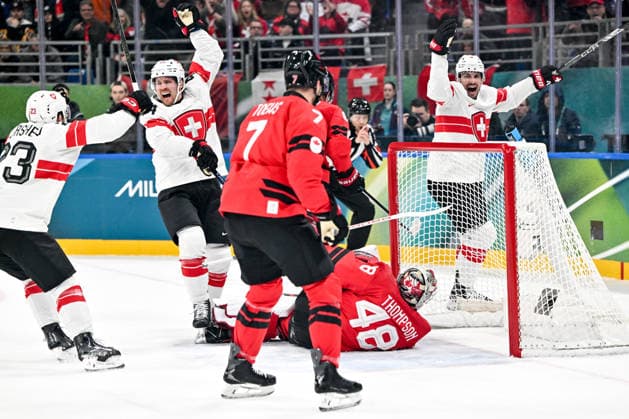 MILAN, ITALY - FEBRUARY 13: Pius Suter of Switzerland celebrate his goal with Philipp Kurashev of Switzerland L) and Damien Riat of Switzerland R) during the Men™s Prelim Round match between Canada and Switzerland on day seven of the Milano Cortina 2026 Winter Olympic Games, Olympische Spiele, Olympia, OS at Milano Santagiulia IHO Arena on February 13, 2026 in Milan, Italy. Milan Milano Santagiulia IHO Arena Italy *** MILAN, ITALY FEBRUARY 13 Pius Suter of Switzerland celebrate his goal with Philipp Kurashev of Switzerland L and Damien Riat of Switzerland R during the Men™s Prelim Round match between Canada and Switzerland on day seven of the Milano Cortina 2026 Winter Olympic games at Milano Santagiulia IHO Arena on February 13, 2026 in Milan, Italy Milan Milano Santagiulia IHO Arena Italy Copyright: xJustPictures.ch AndreaxBrancax jp-en-EuSpIm-AB-AAB_558413022026