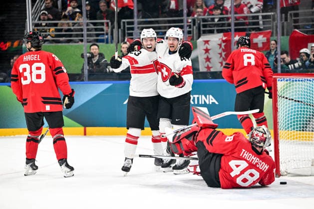 MILAN, ITALY - FEBRUARY 13: Pius Suter of Switzerland R) and Philipp Kurashev of Switzerland L) celebrate a goal during the Men™s Prelim Round match between Canada and Switzerland on day seven of the Milano Cortina 2026 Winter Olympic Games, Olympische Spiele, Olympia, OS at Milano Santagiulia IHO Arena on February 13, 2026 in Milan, Italy. Milan Milano Santagiulia IHO Arena Italy *** MILAN, ITALY FEBRUARY 13 Pius Suter of Switzerland R and Philipp Kurashev of Switzerland L celebrate a goal during the Men™s Prelim Round match between Canada and Switzerland on day seven of the Milano Cortina 2026 Winter Olympic games at Milano Santagiulia IHO Arena on February 13, 2026 in Milan, Italy Milan Milano Santagiulia IHO Arena Italy Copyright: xJustPictures.ch AndreaxBrancax jp-en-EuSpIm-AB-AAB_560513022026