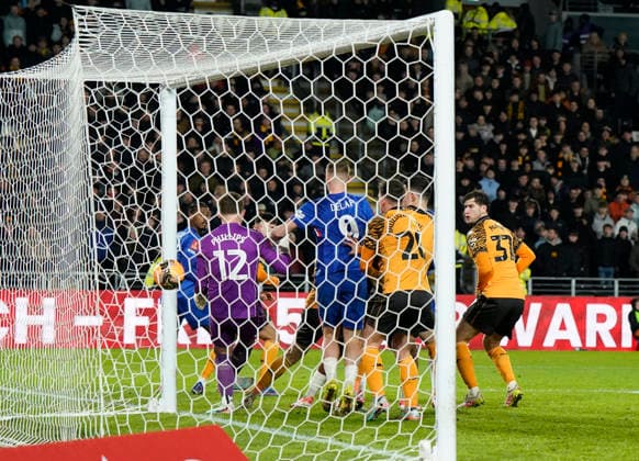 Kingston upon Hull, England, 13th February 2026. Pedro Neto of Chelsea scores the second goal during the Hull City vs Chelsea FA Cup fourth round match at the MKM Stadium, Kingston upon Hull. Picture credit should read: Andrew Yates Sportimage EDITORIAL USE ONLY. No use with unauthorised audio, video, data, fixture lists, club league logos or live services. Online in-match use limited to 120 images, no video emulation. No use in betting, games or single club league player publications. SPI_038_AY_Hull_Chelsea SPI-4532-0035