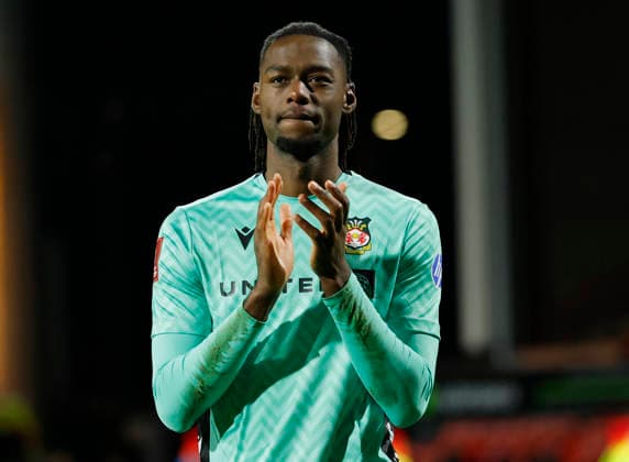 Wrexham, Wales, 13th February 2026. Arthur Okonkwo of Wrexham claps the fans during the Wrexham vs Ipswich Town FA Cup fourth round match at the SToK Car Ras, Wrexham. Picture credit should read: Cody Froggatt Sportimage EDITORIAL USE ONLY. No use with unauthorised audio, video, data, fixture lists, club league logos or live services. Online in-match use limited to 120 images, no video emulation. No use in betting, games or single club league player publications. SPI_041_CF_WREXHAM_V_IPSWICH SPI-4531-0041