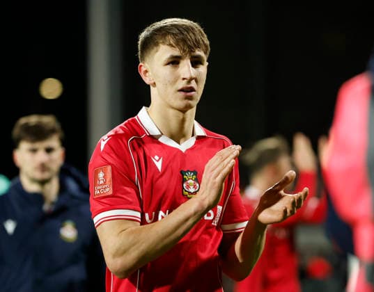 Wrexham, Wales, 13th February 2026. Max Cleworth of Wrexham claps the fans during the Wrexham vs Ipswich Town FA Cup fourth round match at the SToK Car Ras, Wrexham. Picture credit should read: Cody Froggatt Sportimage EDITORIAL USE ONLY. No use with unauthorised audio, video, data, fixture lists, club league logos or live services. Online in-match use limited to 120 images, no video emulation. No use in betting, games or single club league player publications. SPI_042_CF_WREXHAM_V_IPSWICH SPI-4531-0042
