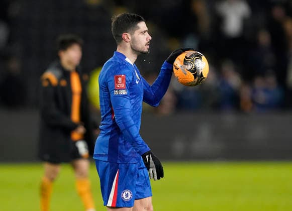 Kingston upon Hull, England, 13th February 2026. Pedro Neto of Chelsea with the match ball after scoring a hat trick during the Hull City vs Chelsea FA Cup fourth round match at the MKM Stadium, Kingston upon Hull. Picture credit should read: Andrew Yates Sportimage EDITORIAL USE ONLY. No use with unauthorised audio, video, data, fixture lists, club league logos or live services. Online in-match use limited to 120 images, no video emulation. No use in betting, games or single club league player publications. SPI_061_AY_Hull_Chelsea SPI-4532-0061