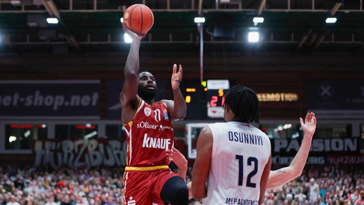In the picture from left Eddy Edigin Wuerzburg Baskets, 27 with the basketball against Osun Osunniyi MLP Academics Heidelberg, 12 13 02 2026, Fitness First Wuerzburg Baskets vs MLP Academics Heidelberg, easyCredit BBL, Matchday 20, Germany, 97072, tectake Arena Wuerzburg, Copyright: HMBxMedia xJulienxBecker