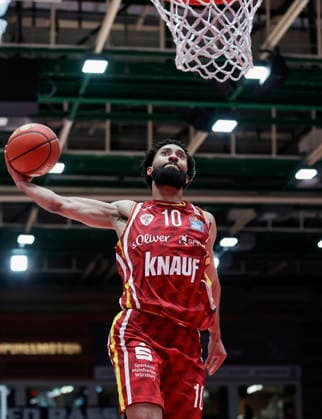 In the picture Davion Mintz Wuerzburg Baskets, 10 with the dunk 13 02 2026, Fitness First Wuerzburg Baskets vs MLP Academics Heidelberg, easyCredit BBL, Matchday 20, Germany, 97072, tectake Arena Wuerzburg, Copyright: HMBxMedia xJulienxBecker
