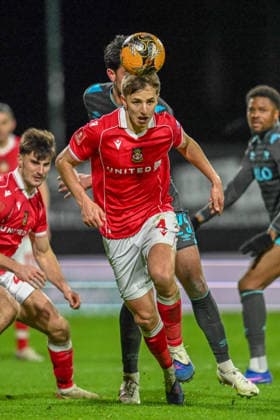 Wrexham v Ipswich Town Emirates FA Cup Max Cleworth of Wrexham heads the ball during the Emirates FA Cup Fourth Round match at the STÅ?K Racecourse, Wrexham 13 02 2026 UK Newspapers OUT Copyright: xKarlxVallantinex FIL-22976-0027