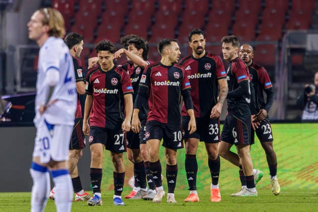 Nuremberg, Germany February 13, 2026 2 Liga 2025 2026 1 FC Nuremberg vs Karlsruher SC In the picture in the grape goal scorer Julian Justvan FCN cheers with his teammates after his goal for 1 0, DFL regulations prohibit any use of photographs as image sequences and or quasi video Max Morlock Stadion Bayern Copyright: xFotostandx xSchäferx