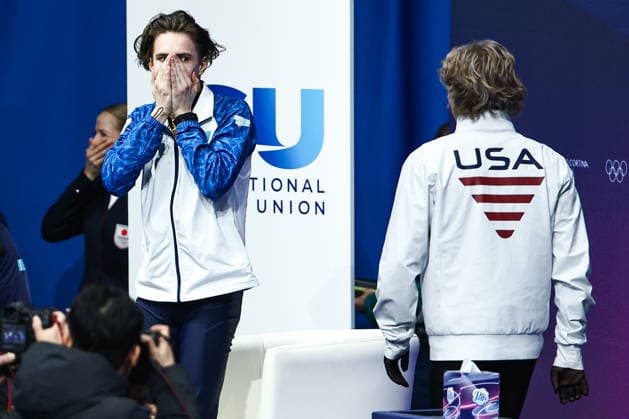 ITALY, MILAN - FEBRUARY 13, 2026: Figure skater Mikhail Shaidorov (L) of Kazakhstan reacts as he wins the men s Figure skating, Eiskunstlauf event at the 2026 Winter Olympic Games, Olympische Spiele, Olympia, OS at Milano Ice Skating Arena. Pictured: figure skater Ilia Malinin (R) of the United States 2026 Winter Olympics: Figure Skating  - ZUMAt113 20260213_zaa_t113_693 Copyright: xMikhailxTereshchenkox