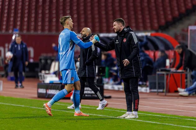 Nuremberg, Germany February 13, 2026 2 Liga 2025 2026 1 FC Nuremberg vs Karlsruher SC In the picture from left goalkeeper Jan Reichert FCN cheers after the goal to 3 0 DFL regulations prohibit any use of photographs as image sequences and or quasi video Max Morlock Stadion Bayern Copyright: xFotostandx xSchäferx