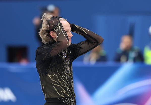 (260214) -- MILAN, Feb. 14, 2026 -- Ilia Malinin of the United States reacts after his performance during the men s single skating free skating of Figure skating, Eiskunstlauf event at the Milan-Cortina 2026 Olympic Winter games, Winterspiele,Spiele, Summer games in Milan, Italy, Feb. 13, 2026. ) (MICO2026)ITALY-MILAN-OLYMPIC WINTER GAMES-FIGURE SKATING-MEN S SINGLE SKATING-FREE SKATING LixMing 