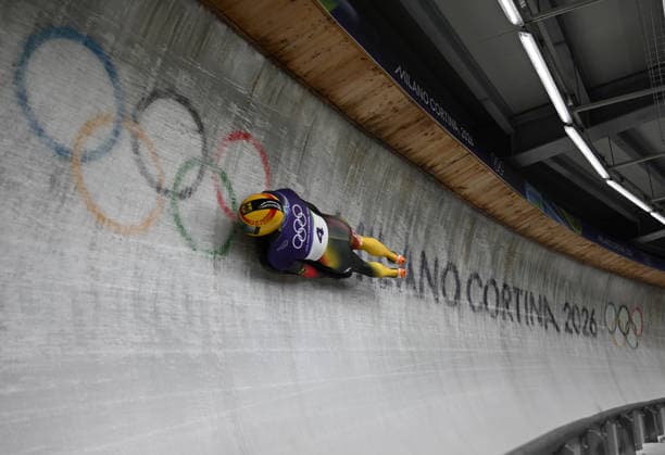 (260214) -- CORTINA D AMPEZZO, Feb. 14, 2026 -- Axel Jungk of Germany competes during the skeleton men competition heat 3 at the Milan-Cortina 2026 Olympic Winter games, Winterspiele,Spiele, Summer games in Cortina, Italy, Feb. 13, 2026. ) (MICO2026)ITALY-CORTINA D AMPEZZO-OLYMPIC WINTER GAMES-SKELETON-MEN LianxYi 
