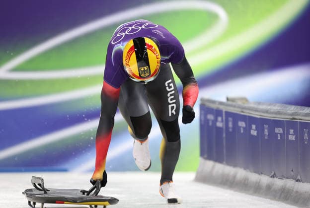 (260214) -- CORTINA D AMPEZZO, Feb. 14, 2026 -- Axel Jungk of Germany competes during the skeleton men competition heat 3 at the Milan-Cortina 2026 Olympic Winter games, Winterspiele,Spiele, Summer games in Cortina, Italy, Feb. 13, 2026. ) (MICO2026)ITALY-CORTINA D AMPEZZO-OLYMPIC WINTER GAMES-SKELETON-MEN DingxXu 