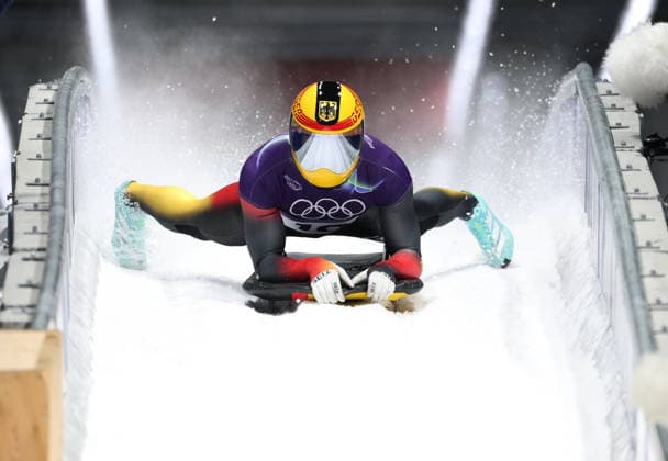 (260214) -- CORTINA D AMPEZZO, Feb. 14, 2026 -- Christopher Grotheer of Germany reacts after crossing the finish line during the skeleton men competition heat 4 at the Milan-Cortina 2026 Olympic Winter games, Winterspiele,Spiele, Summer games in Cortina, Italy, Feb. 13, 2026. ) (MICO2026)ITALY-CORTINA D AMPEZZO-OLYMPIC WINTER GAMES-SKELETON-MEN DingxXu 