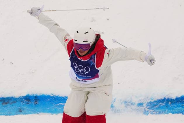 February 14, 2026, Livigno, Italy: Canada s Ashley Koehler crosses the finish line during the women s dual moguls 1 8 final at the Milano Cortina 2026 Winter Olympic Games, Olympische Spiele, Olympia, OS in Livigno, Italy, Saturday, Feb. 14, 2026. Canada News - February 14, 2026  - ZUMAc35_ 20260214_zaf_c35_004 Copyright: xSeanxKilpatrickx