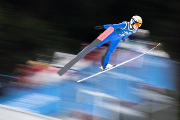 OLYMPICS - Winter Olympic Games, Olympische Spiele, Olympia, OS Milano Cortina 2026 PREDAZZO,ITALY,14.FEB.26 - OLYMPICS, Ski jumping, Skispringen, Ski, nordisch - Winter Olympic Games Milano Cortina 2026, large hill, women, training. Image shows Maja Kovacic (SLO) in front of the judges tower.  GEPAxpictures xOliverxLerch