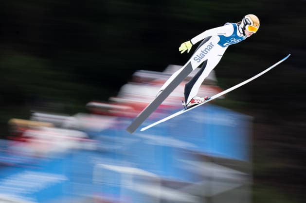 OLYMPICS - Winter Olympic Games, Olympische Spiele, Olympia, OS Milano Cortina 2026 PREDAZZO,ITALY,14.FEB.26 - OLYMPICS, Ski jumping, Skispringen, Ski, nordisch - Winter Olympic Games Milano Cortina 2026, large hill, women, training. Image shows Nicole Maurer (CAN) in front of the judges tower.  GEPAxpictures xOliverxLerch