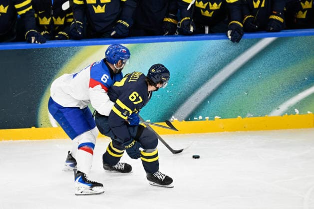 Winter Olympics - Men s Ice hockey, Eishockey - Sweden v Slovakia Lukas Cingel 6 of Team Slovakia and Rickard Rakell 67 of Team Sweden during the men s ice hockey game between Sweden and Slovakia during the 2026 Winter Olympics on February 14, 2026 in Milan, Italy. Photo by JMP ABACAPRESS.COM Milan Italy  Copyright: xJMP ABACAx