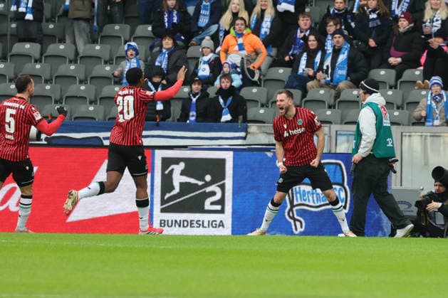 2 Soccer Bundesliga Hertha BSC Hannover 96 , 14 02 2026 Goal celebration, cheering Boris Tomiak Hannover, 3 celebrates the goal to 0 1 with Ime Okon Hannover, 20 , during the match in the 2 Soccer Bundesliga Hertha BSC Hannover 96 in Berlin, Olympiastadion, on 14 02 2026 DFB regulations prohibit any use of photographs as image sequences and or quasi video Copyright: xBEAUTIFULxSPORTS Frankex