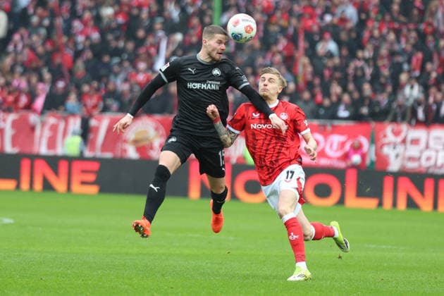 14 02 2026, xrekx, Fußball 2 Bundesliga, 1 FC Kaiserslautern SpVgg Greuther Fuerth v l Jan Elvedi SpVgg Greuther Fuerth Norman Bassette 1 FC Kaiserslautern Zweikampf, Aktion, action, battle for the ball DFL DFB REGULATIONS PROHIBIT ANY USE OF PHOTOGRAPHS as IMAGE SEQUENCES and or QUASI VIDEO Kaiserslautern