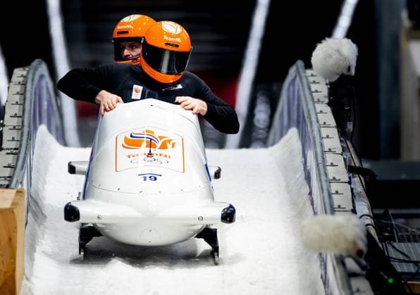 CORTINA - Dave Wesselink and Jelen Franjic training for the two-man bobsleigh event at the Milan Olympics. IRIS VAN DEN BROEK ANP xVIxANPxSportx xxANPxIVx 550665518 originalFilename: 550665518.jpg
