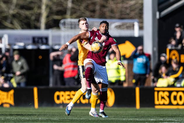 14th February 2026; Pirelli Stadium, Burton, West Staffordshire, England; FA Cup Football, Burton Albion versus West Ham United; Jack Armer of Burton Albion tussles with Adama Traore of West Ham  GodfreyxPitt Content restricted for UK based newspaper