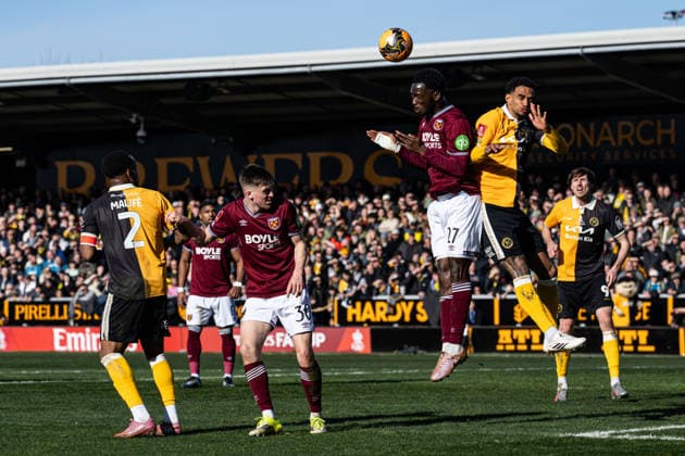 14th February 2026; Pirelli Stadium, Burton, West Staffordshire, England; FA Cup Football, Burton Albion versus West Ham United; Soungoutou Magassa of West Ham United wins a defensive header from Terence Vancooten of Burton Albion  GodfreyxPitt Content restricted for UK based newspaper