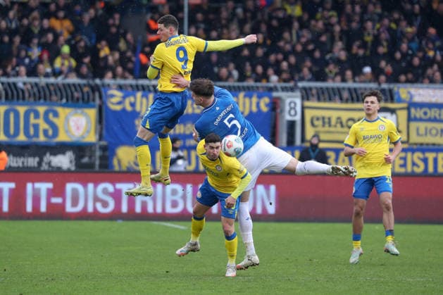 14 02 2026, xgox, Football 2 Bundesliga, Eintracht Braunschweig SV Darmstadt 98 emspor, v l Erencan Yardimci Braunschweig, 9 , Matej Maglica Darmstadt, 5 , Robin Heusser Heußer, Braunschweig, 30 Zweikampf, Duell, Kampf, tackle DFL DFB REGULATIONS PROHIBIT ANY USE OF PHOTOGRAPHS as IMAGE SEQUENCES and or QUASI VIDEO Braunschweig