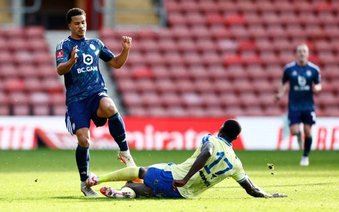Divine Mukasa of Leicester City is tackled by Joshua Quarshie of Southampton. Southampton v Leicester City, Emirates FA Cup, Fourth Round, Football, St Mary s Stadium, Southampton, UK - 14 Feb 2026Southampton St Mary s Stadium United Kingdom EDITORIAL USE ONLY No use with unauthorised audio, video, data, fixture lists, club league logos or live services. Online in-match use limited to 120 images, no video emulation. No use in betting, games or single club league player publications. Copyright: xJamesxMarsh Shutterstockx 16608181z