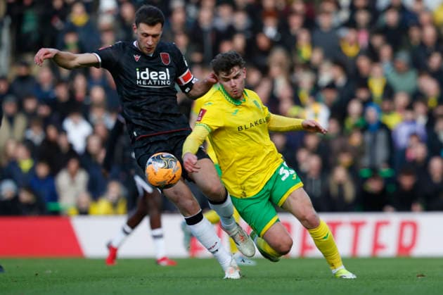 Norwich City v West Bromwich Albion Emirates FA Cup Krystian Bielik of West Bromwich Albion and Mathias Kvistgaarden of Norwich in action during the Emirates FA Cup Fourth Round match at Carrow Road, Norwich 14 02 2026 Commissioned for use in Newsquest Norfolk titles only. All other titles fees apply. UK Newspapers OUT Copyright: xPaulxChestertonx FIL-22967-0097