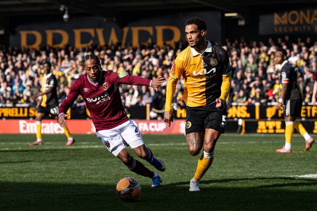 14th February 2026; Pirelli Stadium, Burton, West Staffordshire, England; FA Cup Football, Burton Albion versus West Ham United; Terence Vancooten of Burton Albion holds off Kyle Walker-Peters of West Ham  GodfreyxPitt Content restricted for UK based newspaper