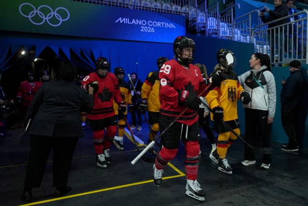 February 14, 2026, Milan, ITALY: Canada s Marie-Philip Poulin (29) leads the team out to the arena for warm up prior to the first period of a women s hockey quarterfinal game against Germany at the 2026 Winter Olympics, in Milan, Saturday, Feb. 14, 2026. Canada News - February 14, 2026  - ZUMAc35_ 20260214_zaf_c35_009 Copyright: xDarrylxDyckx