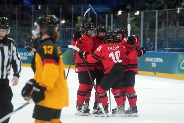 February 14, 2026, Milan, ITALY: Canada s Claire Thompson (42) celebrates her goal with teammates Sophie Jaques (2), Sarah Fillier (10), Kristin O Neill (43) and Daryl Watts (95) during the first period of a women s hockey quarterfinal game against Germany at the 2026 Winter Olympics, in Milan, Saturday, Feb. 14, 2026. Canada News - February 14, 2026  - ZUMAc35_ 20260214_zaf_c35_024 Copyright: xDarrylxDyckx