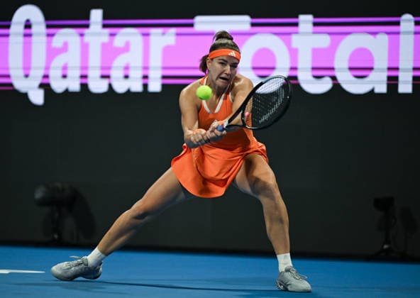 Qatar TotalEnergies Open 2026 - Singles Final DOHA, QATAR FEBRUARY 14: Karolina Muchova of the Czech Republic competes against Victoria Mboko of Canada in the singles final on Day Seven of the Qatar TotalEnergies Open, part of the Hologic WTA, Tennis Damen Tour, at the Khalifa International Tennis and Squash Complex on February 14, 2026 in Doha, Qatar. Doha Qatar  Copyright: xArturxWidakx originalFilename:widak-qatartot260214_npJfC.jpg