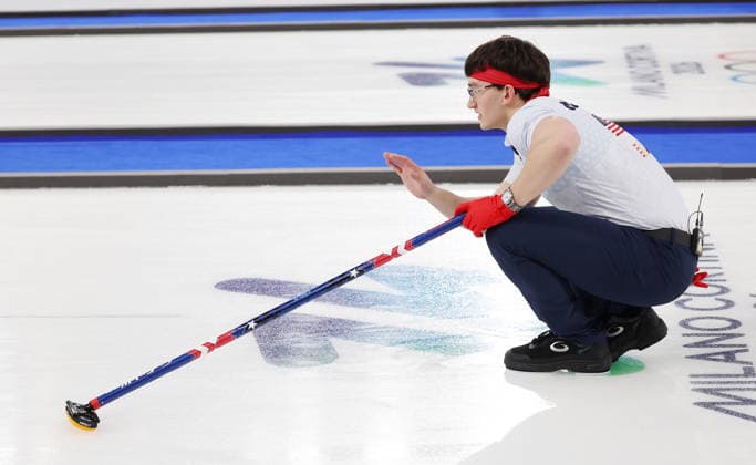 USA s Aidan Oldenburg discusses tactics in the match against Germany in the Round Robin Team Curling match at the 2026 Winter Olympics in Cortina, Italy on Saturday February 14, 2026. USA won the match 8-6.  OLY20260214619 HUGOxPHILPOTT