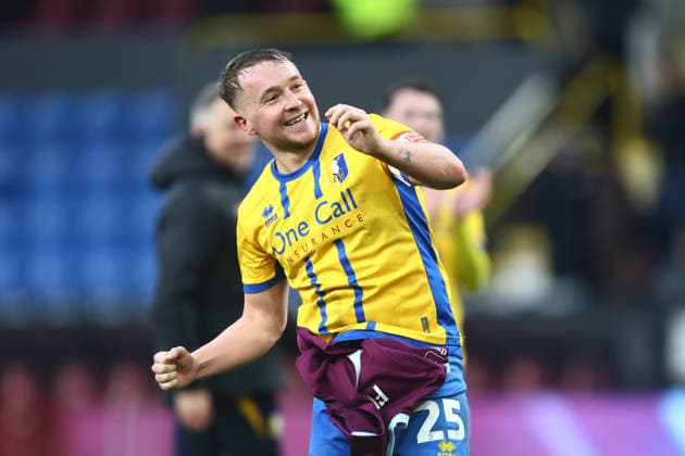 Louis Reed of Mansfield Town celebrates victory Burnley v Mansfield Town, Emirates FA Cup, Fourth Round, Football, Turf Moor, Burnley, UK - 14 Feb 2026Burnley Turf Moor United Kingdom EDITORIAL USE ONLY No use with unauthorised audio, video, data, fixture lists, club league logos or live services. Online in-match use limited to 120 images, no video emulation. No use in betting, games or single club league player publications. Copyright: xPhilxOldham Shutterstockx 16608267bt