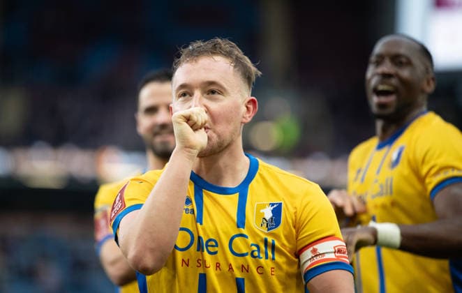 Burnley v Mansfield Town Emirates FA Cup Louis Reed of Mansfield Town celebrates after scoring his sides second goal during the Emirates FA Cup Fourth Round match at Turf Moor, Burnley 14 02 2026 UK Newspapers OUT Copyright: xJamesxHarrisonx FIL-22978-0036