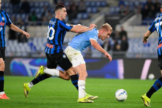 Nikola Krstovic of Atalanta BC and Gustav Isaksen of SS Lazio compete for the ball during the Serie A 2025 2026 football match between SS Lazio and Atalanta BC at Stadio Olimpico in Rome (Italy), February 14, 2026. AndreaxStaccioli