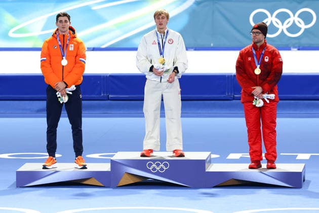 February 14, 2026, Rho, Lombardy, Italy: JORDAN STOLZ of USA (center), JENNING DE BOO of Netherlands (left) and LAURENT DUBREUIL of Canada (right) are the gold, silver and bronze medal winners in the Men s Speed skating, Eisschnelllauf Men s 500m at the Milano Cortina 2026 Winter Olympic Games, Olympische Spiele, Olympia, OS Rho Italy - ZUMAc179 20260214_oly_c179_044 Copyright: xMickaelxChavetx