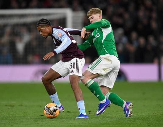 Leon Bailey of Aston Villa in action with Lewis Hall of Newcastle United Aston Villa v Newcastle United, Emirates FA Cup, Fourth Round, Football, Villa Park, Birmingham, UK - 14 Feb 2026Birmingham Villa Park United Kingdom EDITORIAL USE ONLY No use with unauthorised audio, video, data, fixture lists, club league logos or live services. Online in-match use limited to 120 images, no video emulation. No use in betting, games or single club league player publications. Copyright: xAlanxWalter Shutterstockx 16608496ah