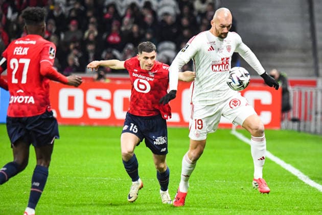 FOOTBALL : Lille OSC vs Stade Brestois - Ligue 1 - JournÃ e 22 - 14 02 2026 Ludovic Ajorque (Stade Brestois) Romain Perraud (Lille OSC) LilleFrance  Copyright: xBaptistexAutissierx