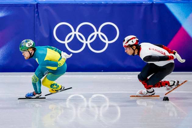 Brendan Corey of Australia and William Dandjinou of Canada Men s 1500m Quarterfinals, Milano Cortina 2026 Winter Olympics: Day 8, Short Track Speed skating, Eisschnelllauf - Milano Cortina 2026 Winter Olympics: Day 8, Milano Speed Skating Stadium, February 14, 2026, Milan, Italy.