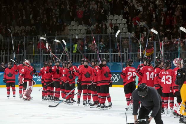 February 14, 2026, Milan, ITALY: Canada players celebrate the team s 5-1 win over Germany following the third period of a women s hockey quarterfinal game at the 2026 Winter Olympics, in Milan, Saturday, Feb. 14, 2026. Canada News - February 14, 2026  - ZUMAc35_ 20260214_zaf_c35_089 Copyright: xDarrylxDyckx