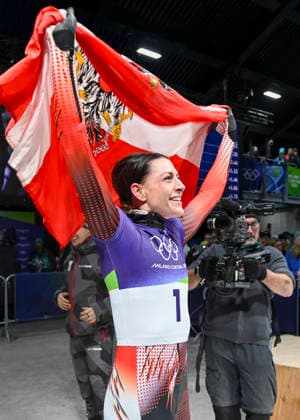 OLYMPICS - Winter Olympic Games, Olympische Spiele, Olympia, OS Milano Cortina 2026 CORTINA D AMPEZZO,ITALY,14.FEB.26 - OLYMPICS, SKELETON - Winter Olympic Games Milano Cortina 2026, women. Image shows the rejoicing of Janine Flock (AUT).  GEPAxpictures xAlexanderxSolc