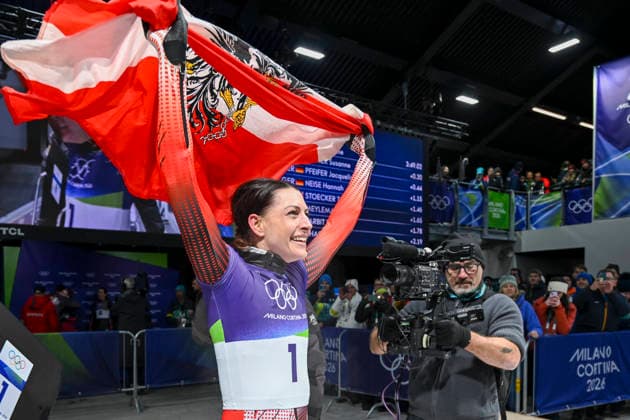 OLYMPICS - Winter Olympic Games, Olympische Spiele, Olympia, OS Milano Cortina 2026 CORTINA D AMPEZZO,ITALY,14.FEB.26 - OLYMPICS, SKELETON - Winter Olympic Games Milano Cortina 2026, women. Image shows the rejoicing of Janine Flock (AUT).  GEPAxpictures xAlexanderxSolc