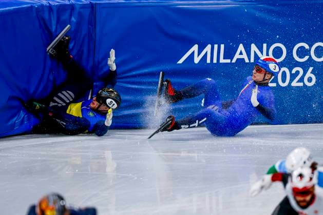 crash Oleh Handei of Ukraine and Pietro Sighel of Italy Men s 1500m Quarterfinals, Milano Cortina 2026 Winter Olympics: Day 8, Short Track Speed skating, Eisschnelllauf - Milano Cortina 2026 Winter Olympics: Day 8, Milano Speed Skating Stadium, February 14, 2026, Milan, Italy.