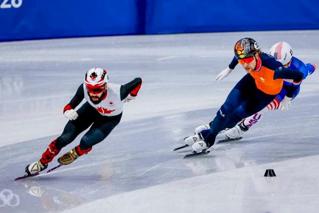 Steven Dubois of Canada and Friso Emons of the Netherlands and Brandon Kim of United States of America Men s 1500m Quarterfinals, Milano Cortina 2026 Winter Olympics: Day 8, Short Track Speed skating, Eisschnelllauf - Milano Cortina 2026 Winter Olympics: Day 8, Milano Speed Skating Stadium, February 14, 2026, Milan, Italy.