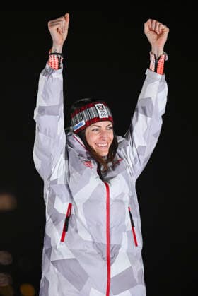 OLYMPICS - Winter Olympic Games, Olympische Spiele, Olympia, OS Milano Cortina 2026 CORTINA D AMPEZZO,ITALY,14.FEB.26 - OLYMPICS, SKELETON - Winter Olympic Games Milano Cortina 2026, women, medal ceremony. Image shows the rejoicing of Janine Flock (AUT).  GEPAxpictures xAlexanderxSolc